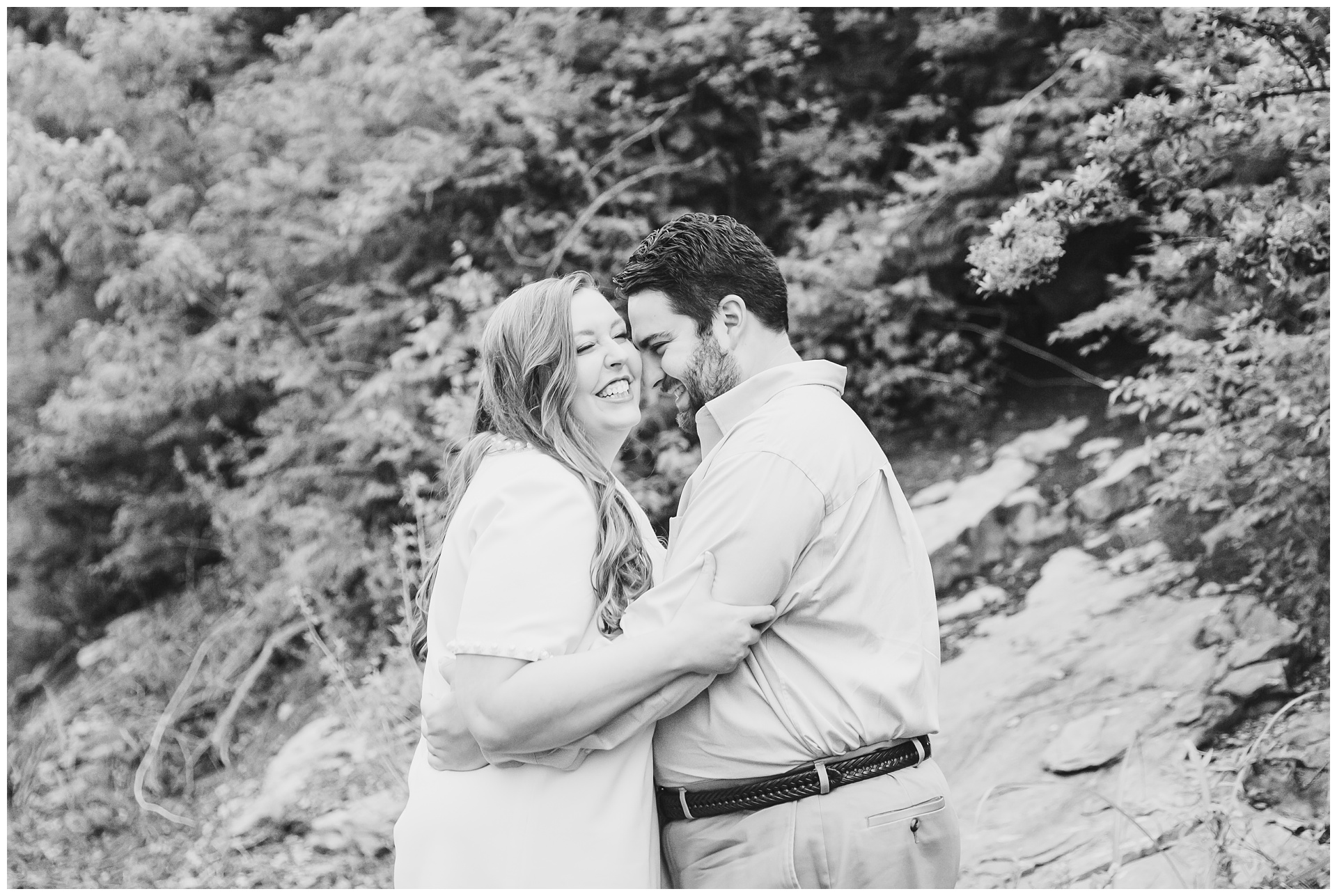 Engagement photography at Briarcliff Waterfall Park by Kansas City wedding photographers Wisdom-Watson Weddings.