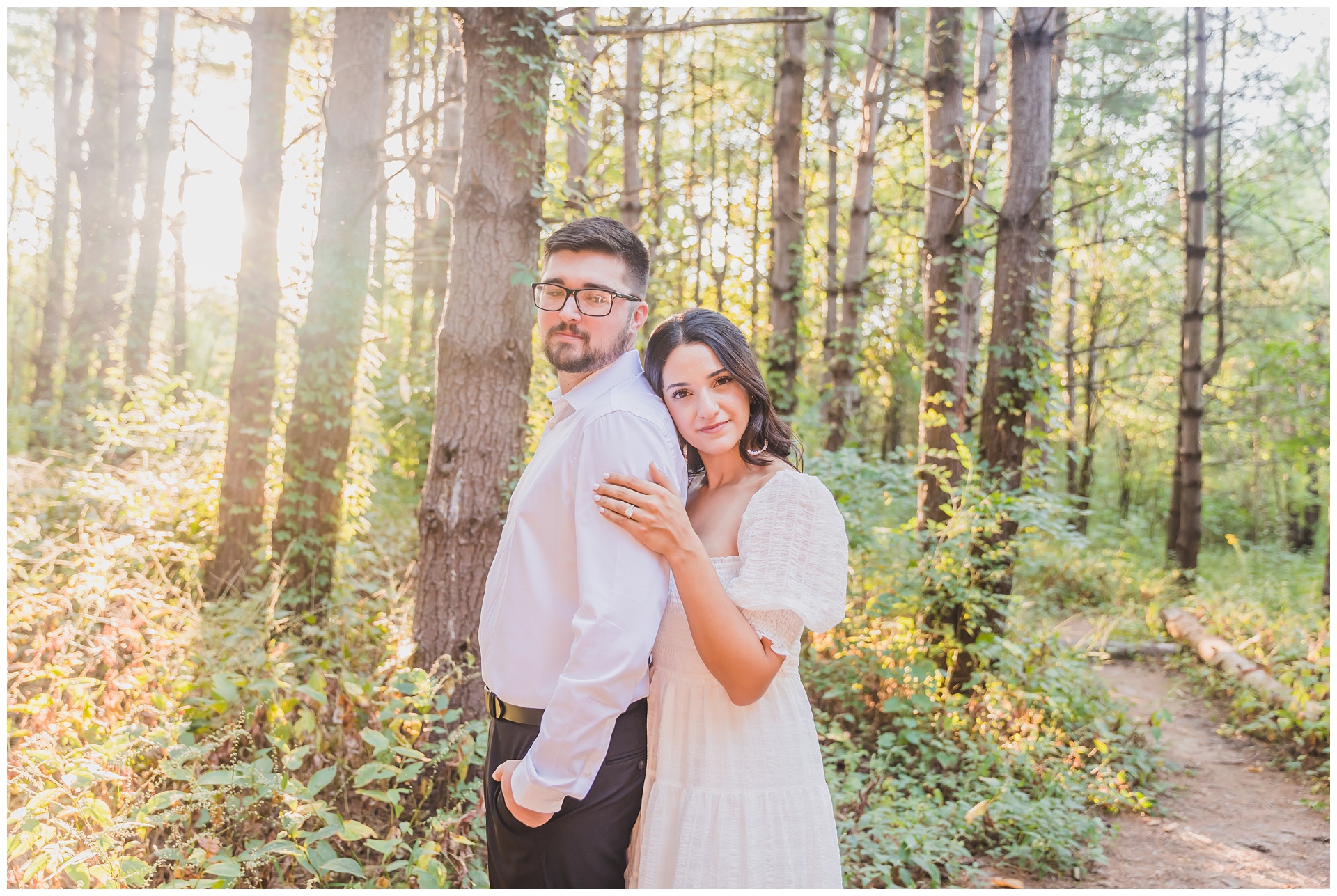 Engagement photography at Burr Oak Woods Conservation Area in Blue Springs, Missouri, by Kansas City wedding photographers Wisdom-Watson Weddings.