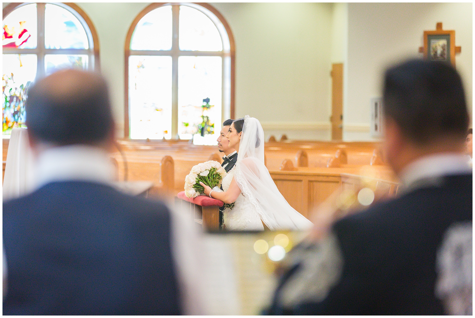 Wedding photography at Divine Mercy Parish in Garner, Kansas, by Kansas City wedding photographers Wisdom-Watson Weddings.