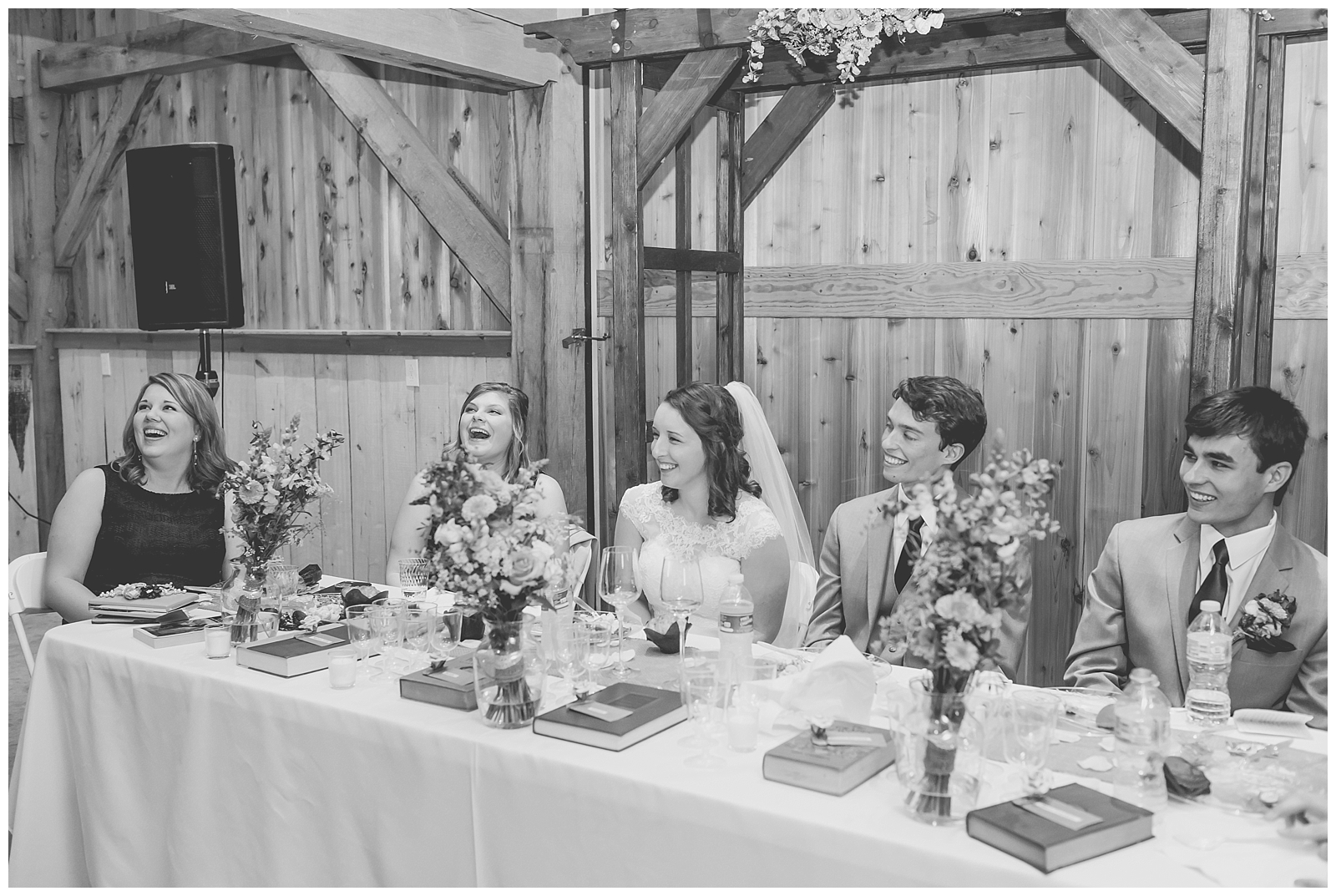 Wedding photography at The Barn at Kill Creek Farm in De Soto, Kansas, by Kansas City wedding photographers Wisdom-Watson Weddings.