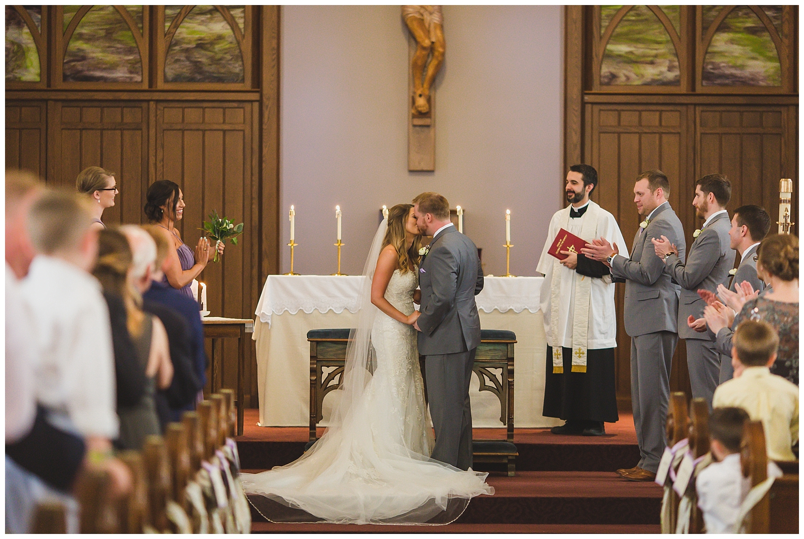 Wedding photography at Guardian Angels Parish by Kansas City wedding photographers Wisdom-Watson Weddings.