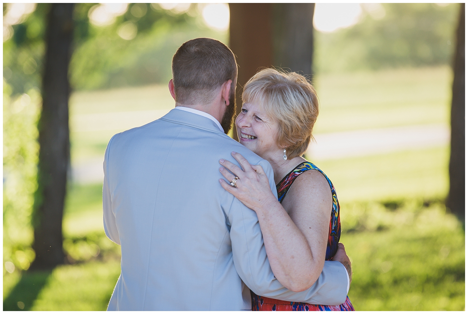 Wedding photography at Theatre in the Park in Shawnee, Kansas, by Kansas City wedding photographers Wisdom-Watson Weddings.