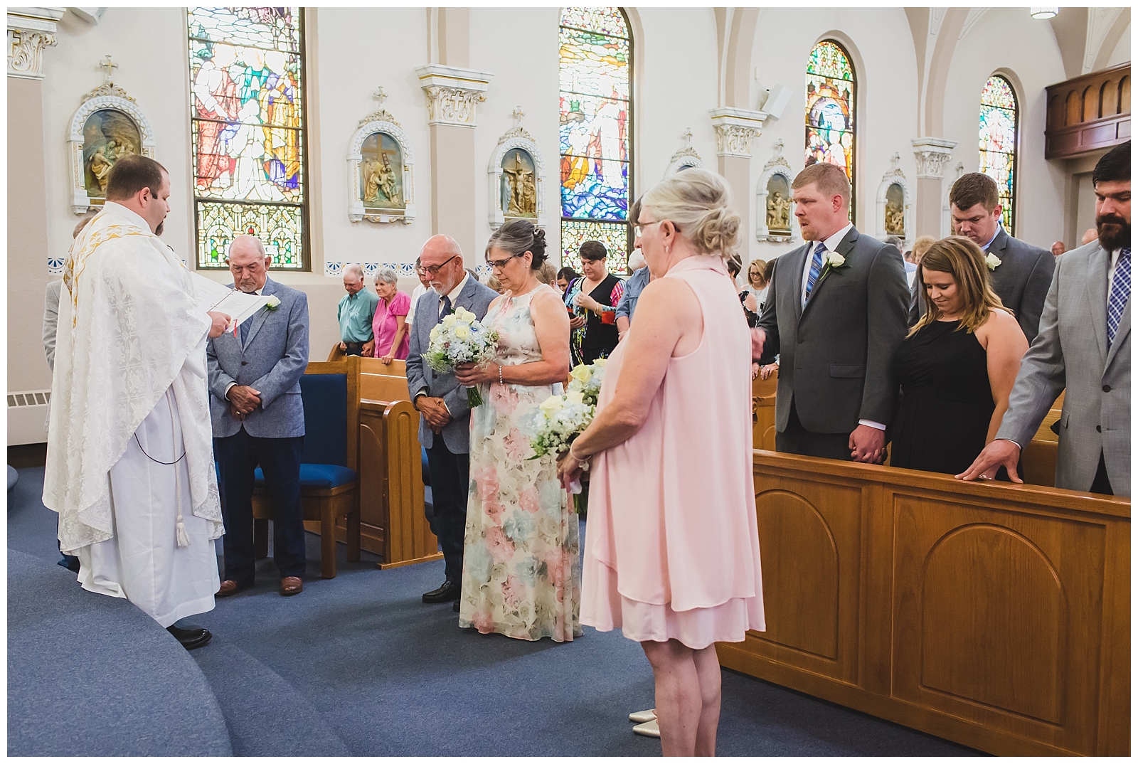 Wedding photography at Holy Angels Catholic Church in Garnett, Kansas, by Kansas City wedding photographers Wisdom-Watson Weddings.