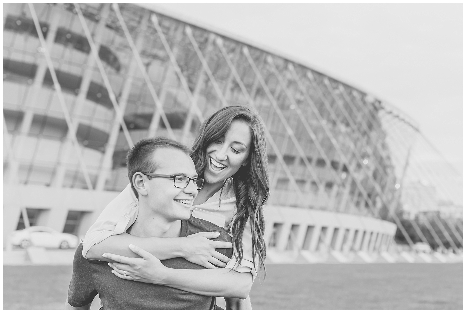Engagement photography at the Kauffman Center for the Performing Arts and the Crossroads Arts District by Kansas City wedding photographers Wisdom-Watson Weddings.