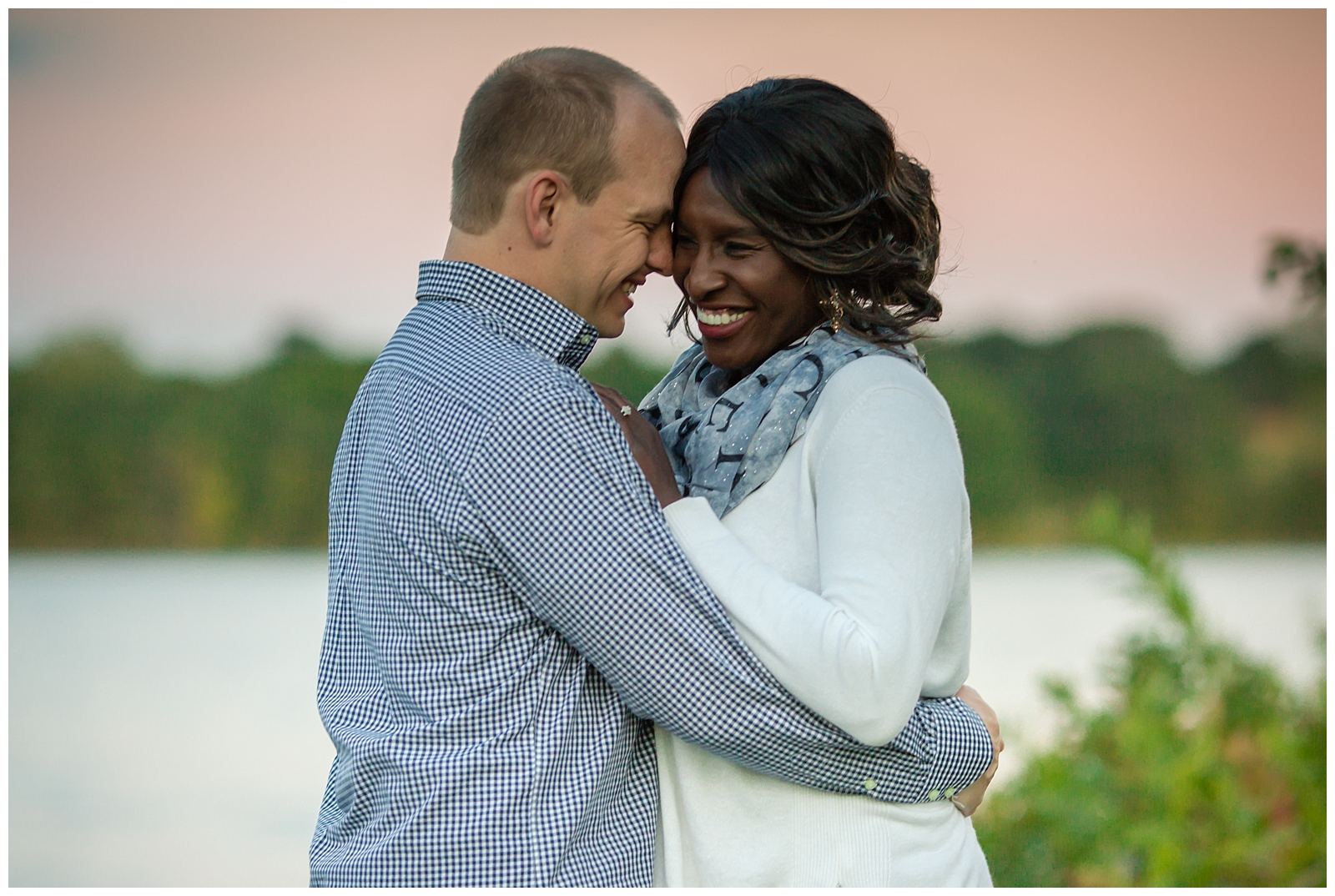 Engagement photography at Lake Shawnee in Topeka, Kansas, by Kansas City wedding photographers Wisdom-Watson Weddings.