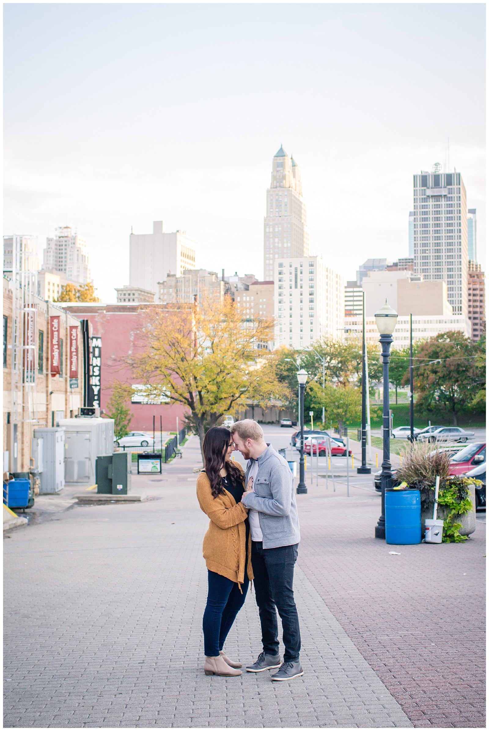 Engagement photography in the River Market by Kansas City wedding photographers Wisdom-Watson Weddings.