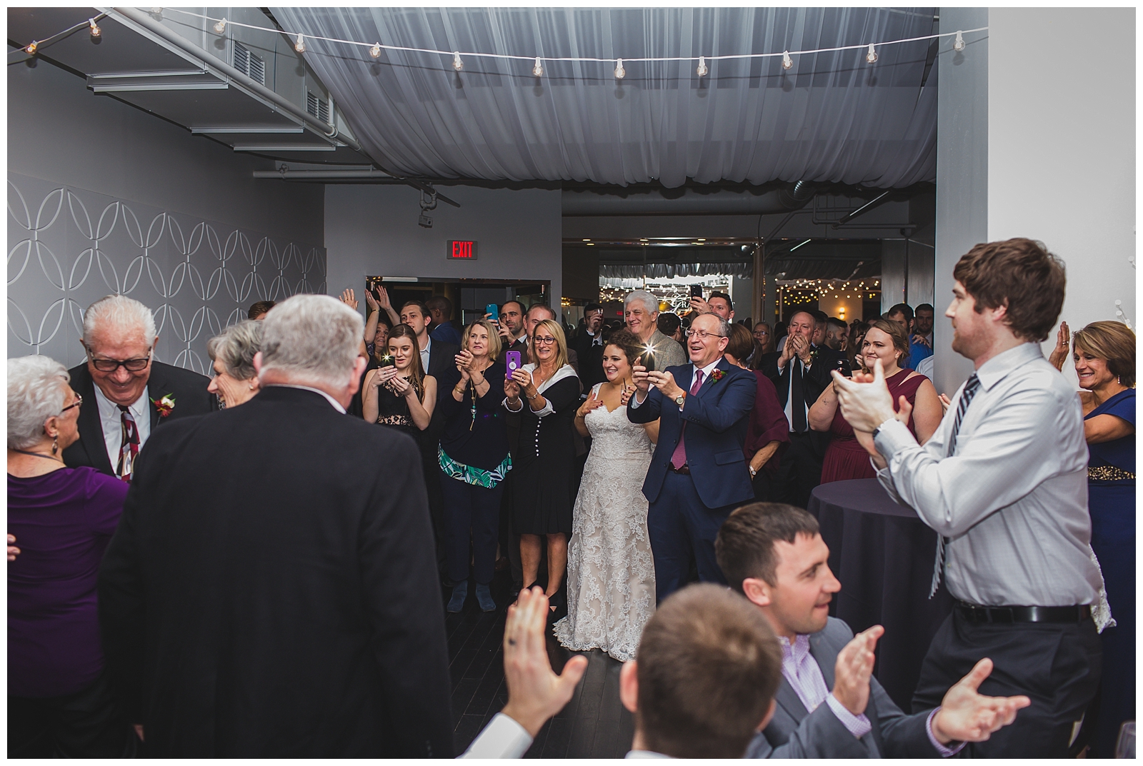 Wedding photography at Grand Street Cafe by Kansas City wedding photographers Wisdom-Watson Weddings.