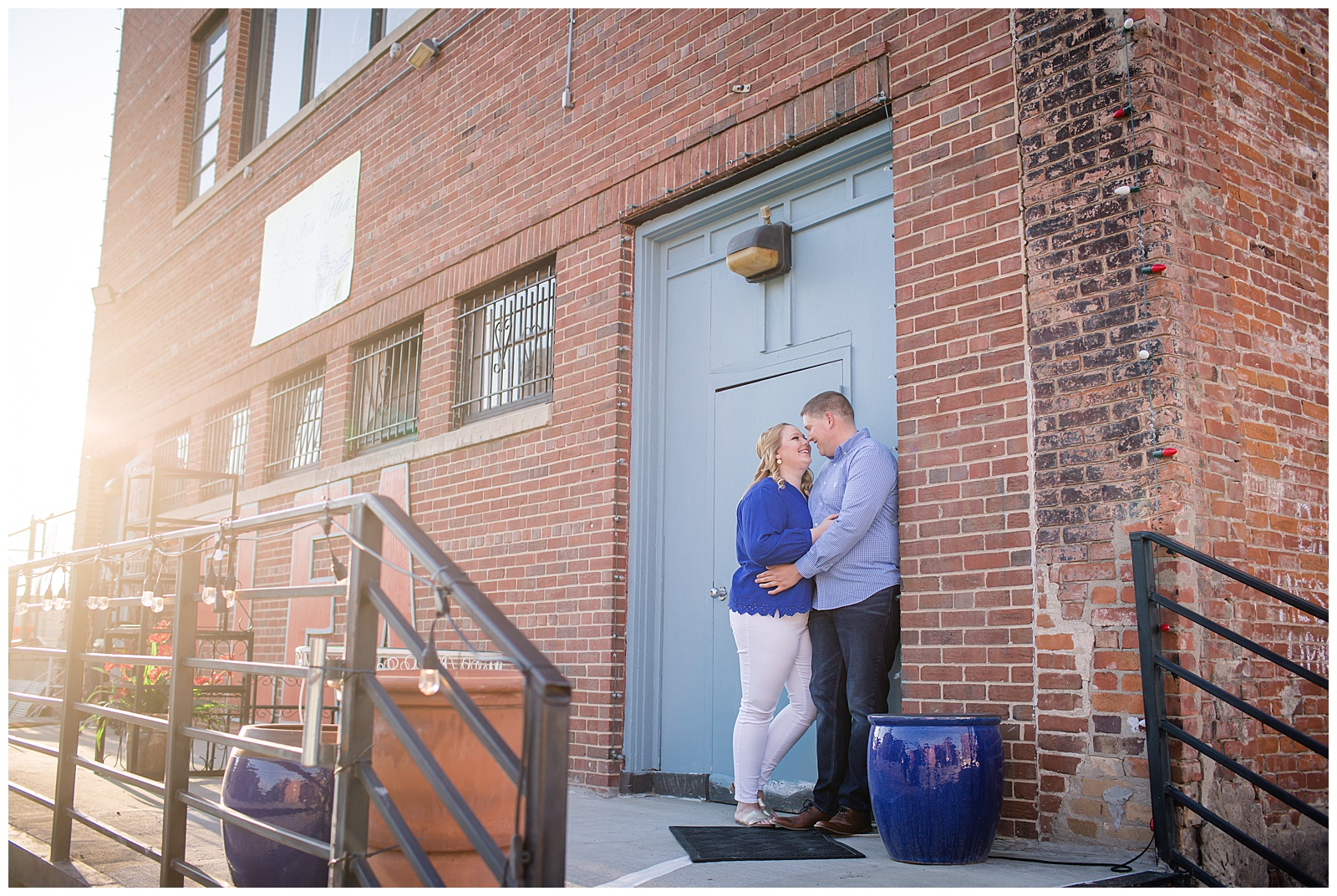 Engagement photography in the West Bottoms and Penn Valley Park by Kansas City wedding photographers Wisdom-Watson Weddings.