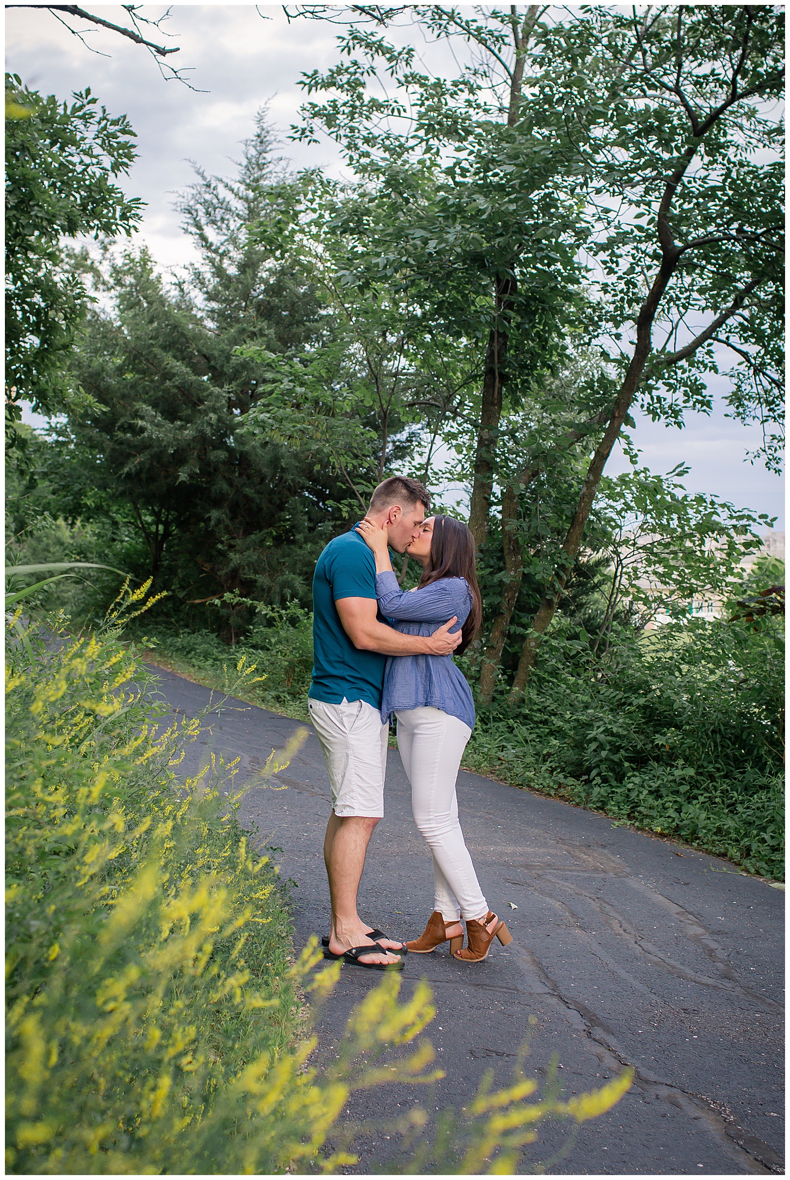 Engagement photography at Briarcliff Waterfall Park by Kansas City wedding photographers Wisdom-Watson Weddings.