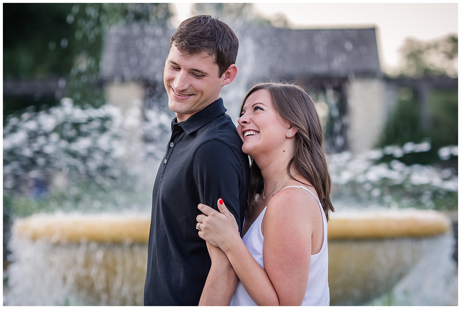 Engagement photography at Loose Park by Kansas City wedding photographers Wisdom-Watson Weddings.