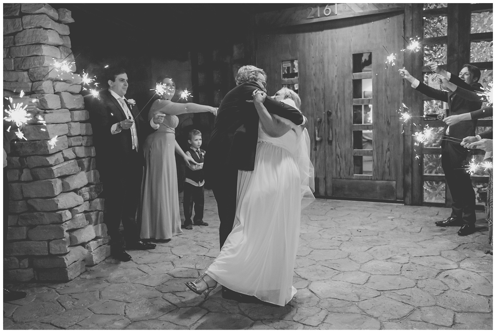 Wedding photography at Arterra Event Gallery in Lawrence, Kansas, by Kansas City wedding photographers Wisdom-Watson Weddings.