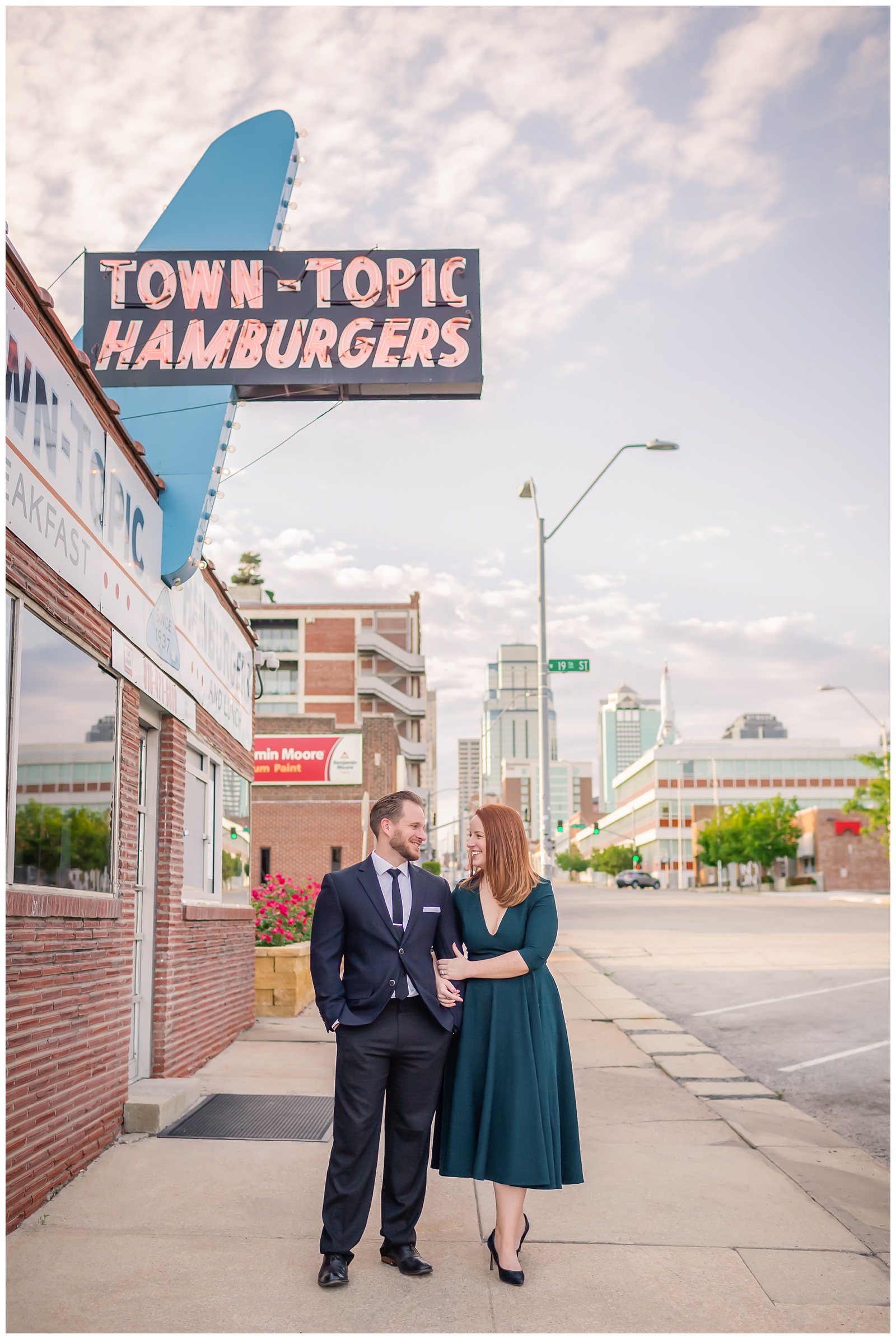 Engagement photography in the Crossroads Arts District by Kansas City wedding photographers Wisdom-Watson Weddings.