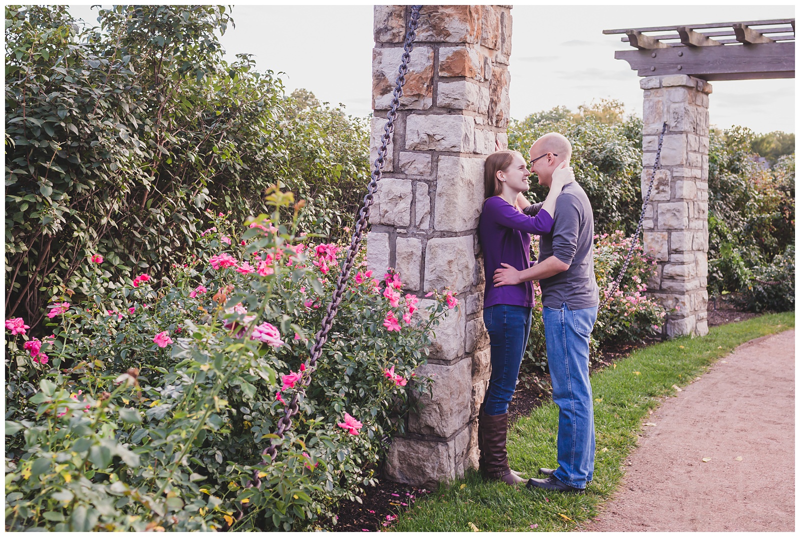 Engagement photography at Loose Park by Kansas City wedding photographers Wisdom-Watson Weddings.