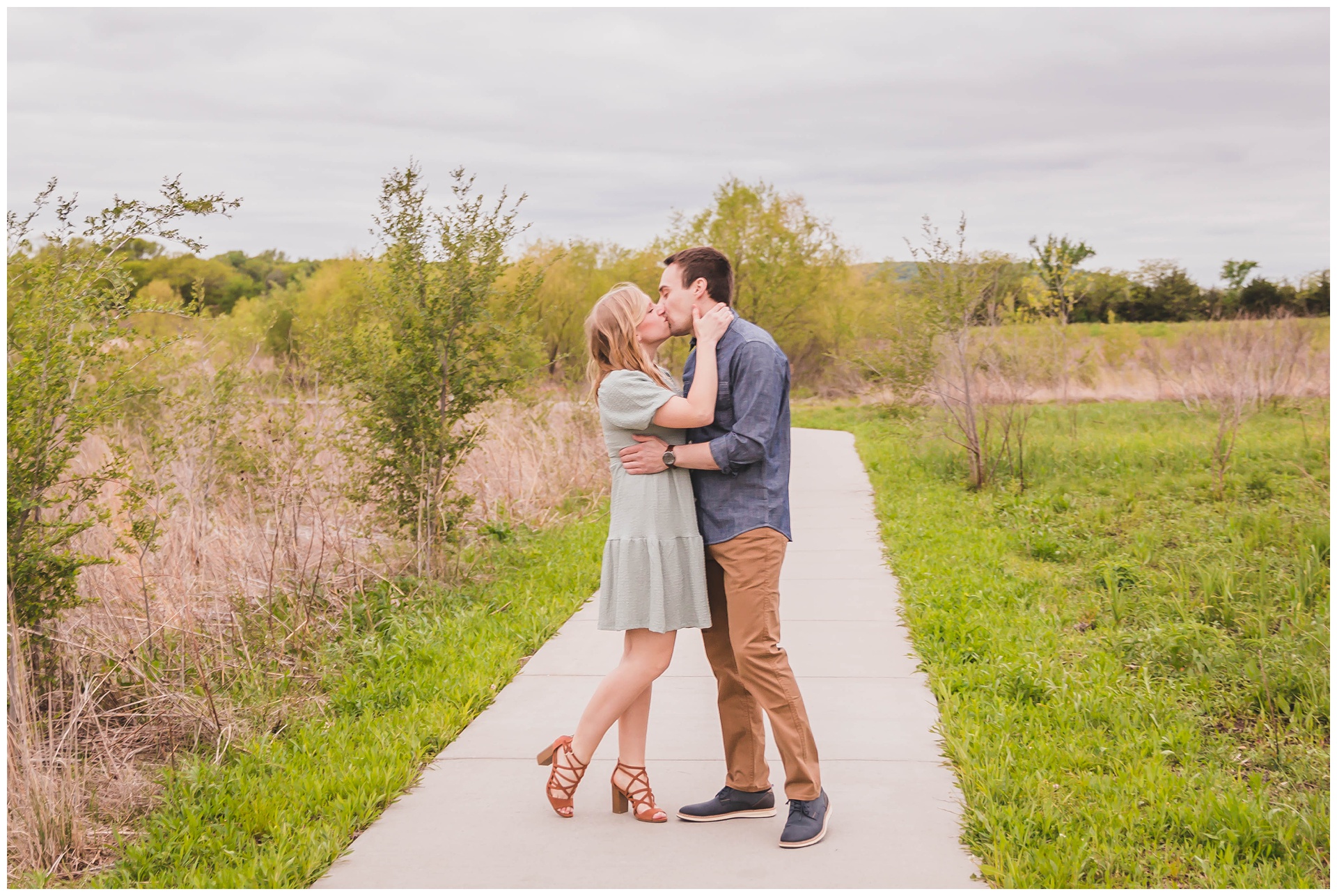 Engagement photography at the Baker University Wetlands in Lawrence, Kansas, by Kansas City wedding photographers Wisdom-Watson Weddings.