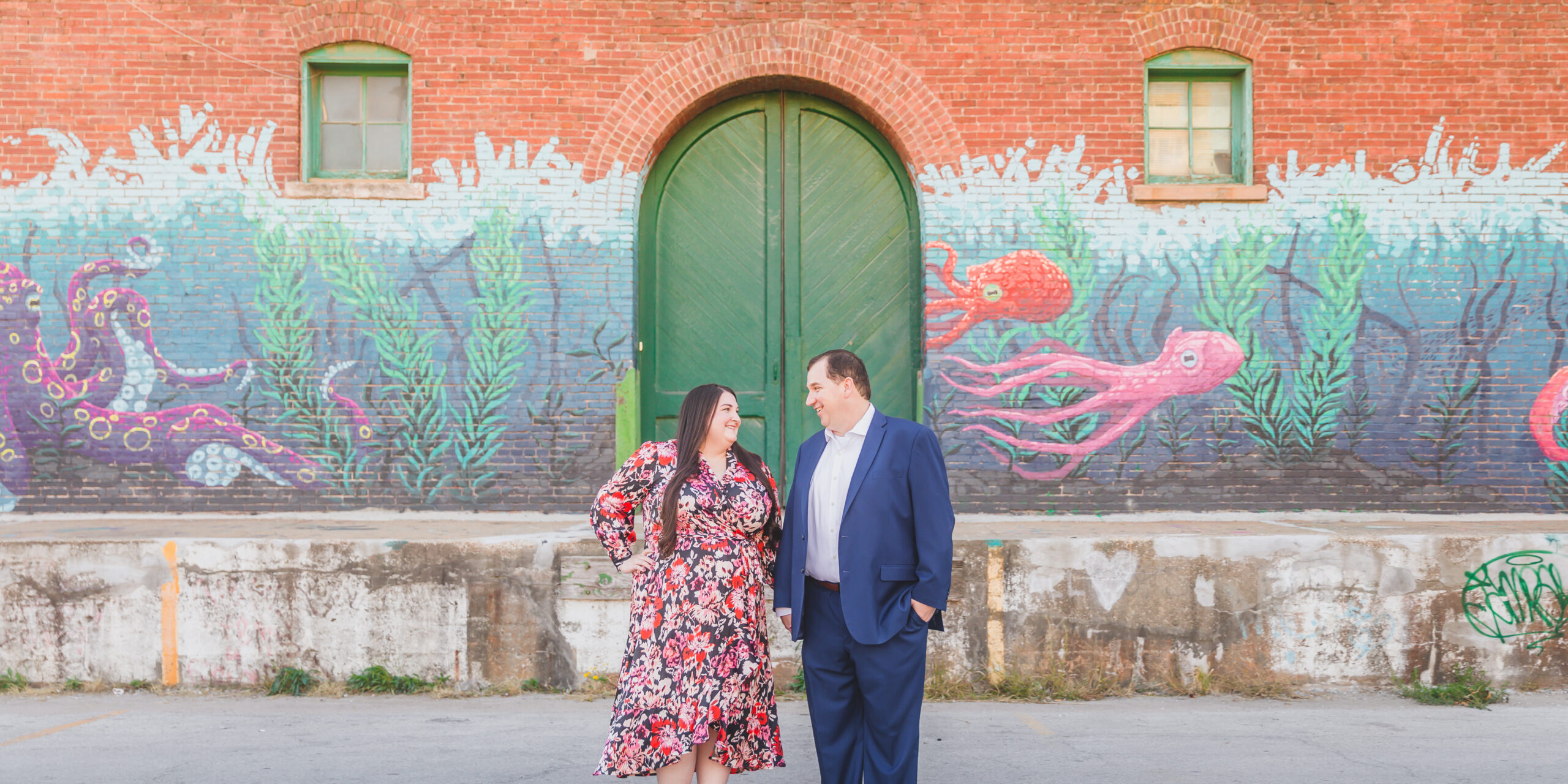 Engagement photography in the West Bottoms by Kansas City wedding photographers Wisdom-Watson Weddings.